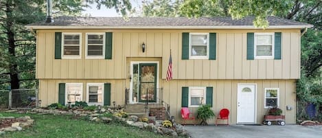 The Kansas Retreat house is surrounded by beautiful hosta and flower gardens. 