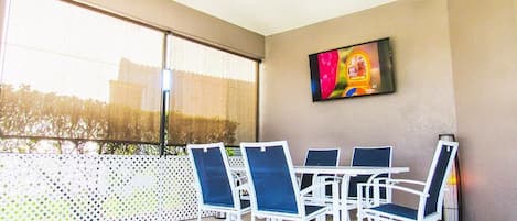 Enjoying dining al fresco under the lanai whilst catching up on your favorite shows.