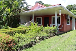 Front of the house including driveway for cars parking