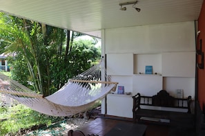 Big hammock, Table and benches in the porch