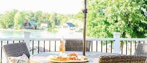 Enjoy the expansive deck of our tiny cottage, overlooking the serene Derby Lake. This delightful outdoor area features a propane grill, perfect for dining al fresco, relaxation and soaking up the views.
