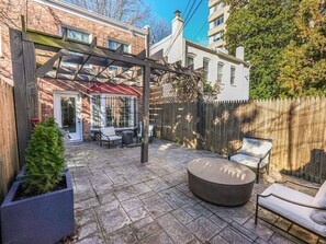 Private Rear Patio: Weber Grill, Restoration Hardware Seating & Table.