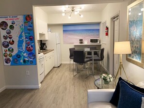 wall map between living room and dining room.