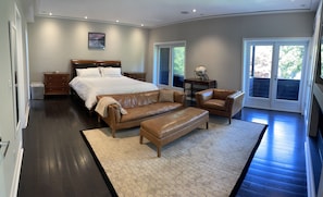 Large master suite with king size bed and sitting area. 