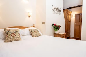 Beautiful double bedroom with king size bed.  Pure down duvet and crisp white bedding for a wonderful night’s sleep.
