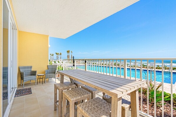 Private patio with pool deck entrance