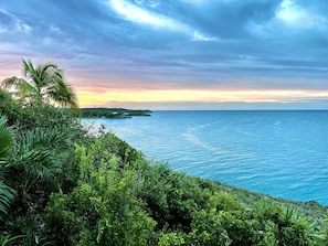 Enjoy the views from a cliff overlooking the Caribbean, with 50-mile ocean and sunset views!