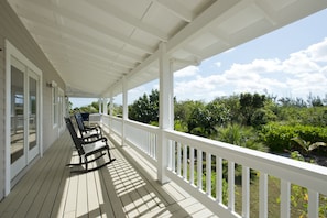 Wrap-around veranda with views of surrounding gardens