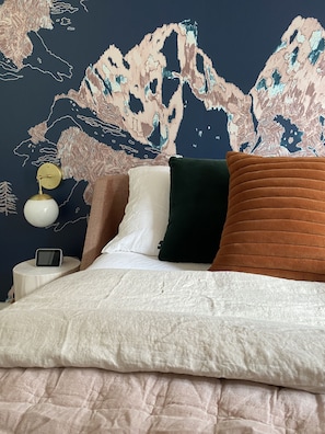 The Mountain suite is outfitted with a king mattress and bedding by Parachute.