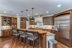 Large, Fully Stocked Kitchen with Bar Seating