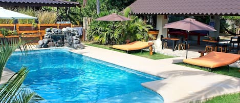 Pool and outdoor bed view