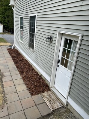 Guests entrance is located on back side of house.