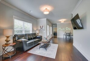 The foyer opens up to a smaller living room on the 1st floor