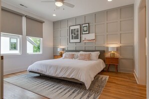 Spacious and welcoming primary bedroom with the coziest king bed!
