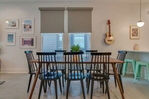Gather around this large dining room table for family dinners or a lively game night!