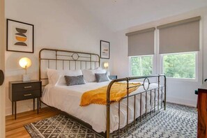 Find tranquility and elegance in our beautifully appointed bedroom, designed for serene slumber.