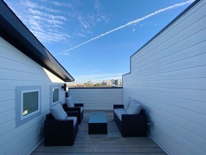 Bask in limitless blue skies from your personal rooftop haven!