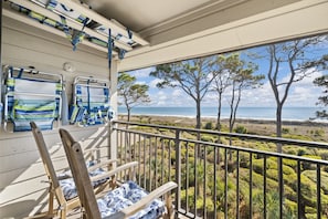 4 Beach Chairs stored in the overhead and on the balcony wall.