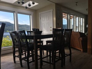 Floor to ceiling windows across the front of the house