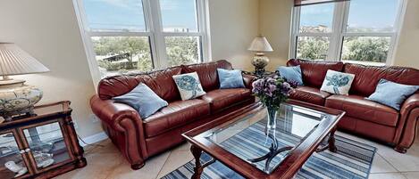 Relax on the leather sofas with an adult beverage.  You can see the ocean through the window...