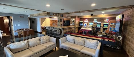 700 sq ft arcade, game room, and sports bar. 