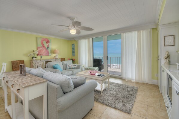 The ocean front living room is well-appointed with comfortable furnishings.