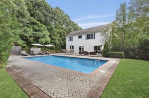 Heated pool w/ spacious yard