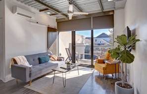 Living Room with Private Balcony