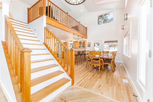 Entryway to loft and kitchen/dining. 