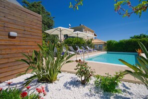Relax and revive around the pool