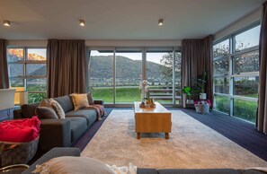 Spacious and cozy lounge at your lakeside accommodation in Queenstown, NZ