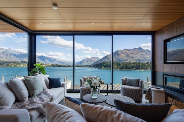 Beautiful lounge area with stunning views over the lake and mountains