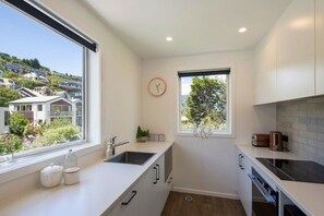 Effortlessly practical kitchen in our Queenstown self-contained accommodation