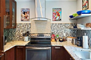 Kitchen is fully stocked to prepare meals.