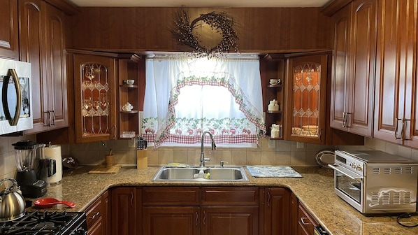 A beautiful, fully-equipped kitchen awaits you. 