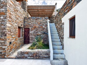 The stairs leading the outdoor dining area and the BBQ