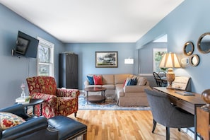 The Cozy Living Room with Smart TV and Reading Nook