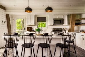 A fully stocked kitchen and dining space!