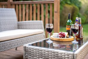 Relax outside on the decking with a cold drink whilst socialising with friends.