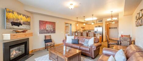 The warm and inviting primary living area has a new HDTV, gas fireplace, leather sleeper sofa & leather loveseat.  There is plenty of room for everyon