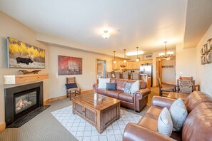 The warm and inviting primary living area has a new HDTV, gas fireplace, leather sleeper sofa & leather loveseat.  There is plenty of room for everyon