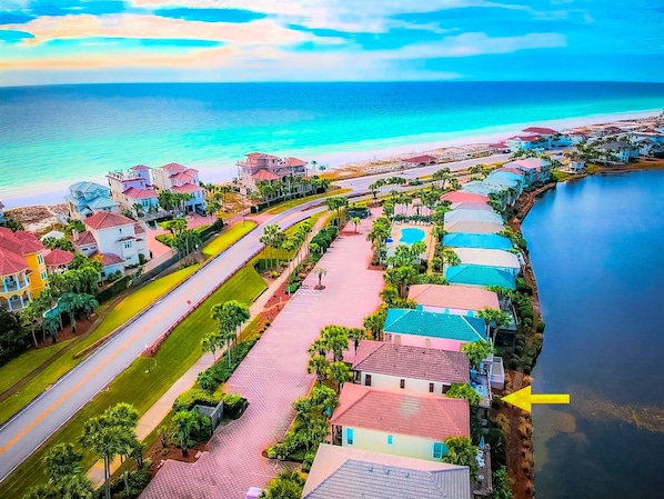 Just steps to the beautiful white sand beach and emerald waters of the Gulf