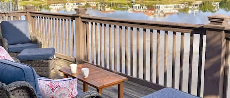 Relax on the waterfront deck with morning coffee from the coffee bar.  Or do it at any time of day, with an amazing lake view!