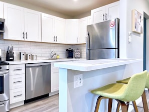 Remodeled Kitchen with quartz counters, and full-sized appliances