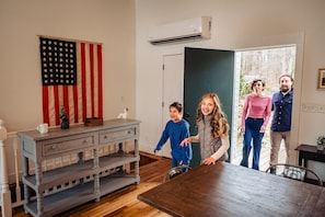 Families step into our Poconos lakefront retreat, gasping in awe at its beauty.