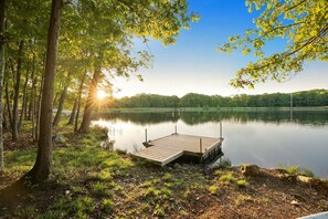 Savor sunrises at our private dock in the Pocono Mountains—pure bliss!