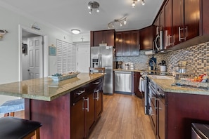 Fully equipped kitchen open space to the living room.