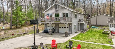 Fire pit + basketball hoop + bag toss + hot tub + ping pong + games = FAMILY FUN