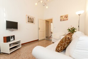 The living room with TV, decoder, DVD player and Stereo