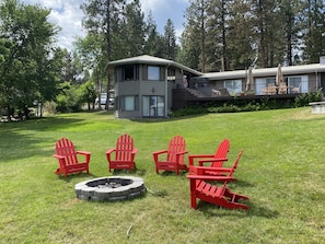 Fire pit w/Adirondack chairs. 